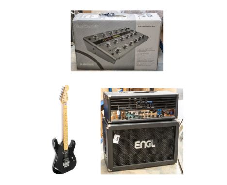 A Charvel black guitar with case, A.T.C. Electroniz G.System effects floor unit, boxed.&nbsp; An Engl Znvader 100 amp.&nbsp; 