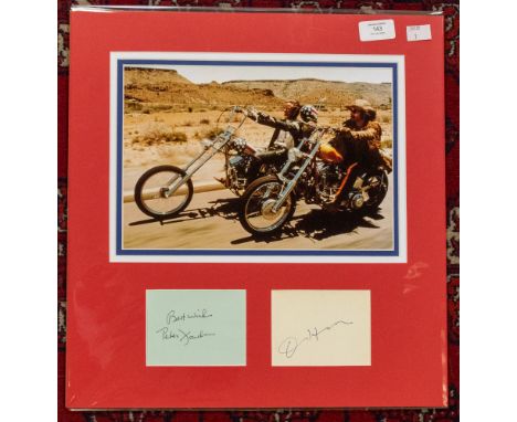 Peter Fonda and Dennis Hopper `Easy Rider` Full colour picture of the two on chopper bikes mounted with signed pages from aut