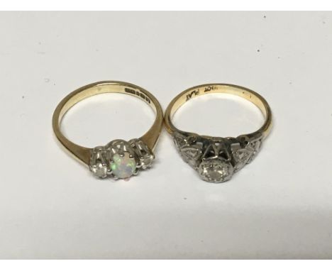 A 9carat gold ring set with an Opal ring size J flanked by small diamonds and one other 18carat and platinum ring set with di