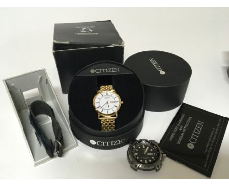 A boxed Gents Citizen Eco-drive watch day date seen working and a gents Casio day date (2)