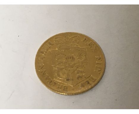 A first year of issue 1817 George III gold half sovereign Shield back. Weight 3.9g