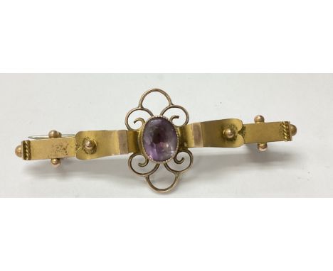 A 9ct gold amethyst set brooch.
