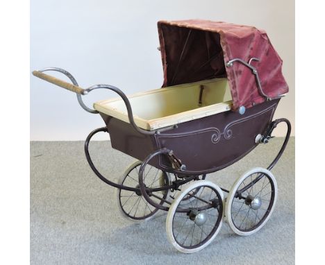 A vintage child's toy pram, 97cm long