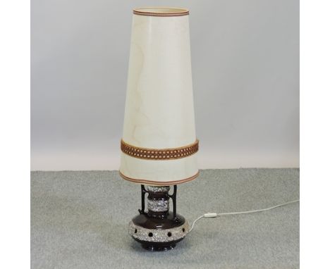 A 1960's pottery table lamp and shade, 114cm high