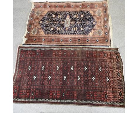 A Persian prayer rug, with all over designs on a red field, 120 x 190cm, together with another