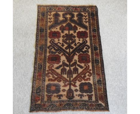 A Turkish prayer rug, with all over designs on a cream field, 133 x 81cm