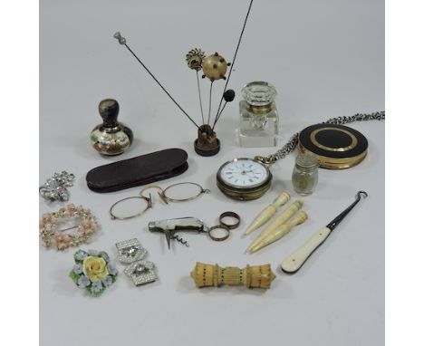 A collection of items to include costume jewellery, hatpins, pocket watch and compact