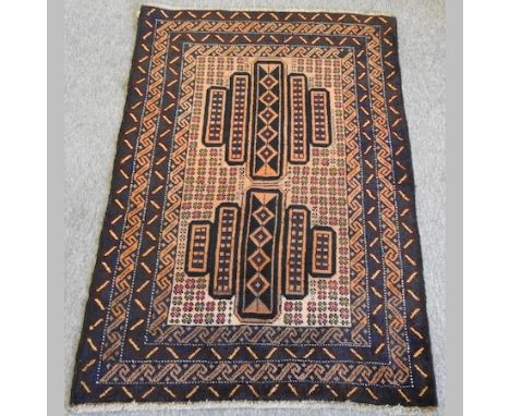 A Turkish Baluchi rug, with two central medallions, within multiple borders, on a yellow ground, 145 x 92cm