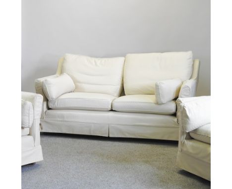 A modern cream upholstered two seater sofa, 182cm, together with a pair matching armchairs 