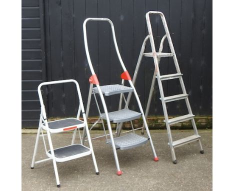 An aluminium step ladder, 155cm high, together with two smaller