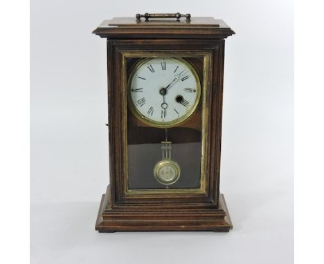 An early 20th century oak cased mantel clock, with a painted dial, 21cm