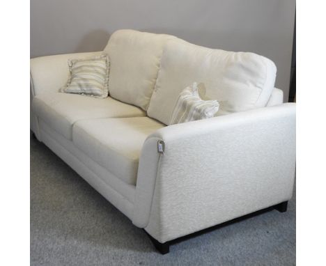 A modern cream upholstered sofa, 221cm