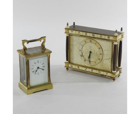 A brass cased carriage clock, 15cm high overall, together with a Junghan's Meister mantel clock