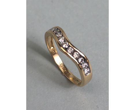 9ct yellow gold wishbone ring set with 11 diamonds size K approximately 1.60g inclusive