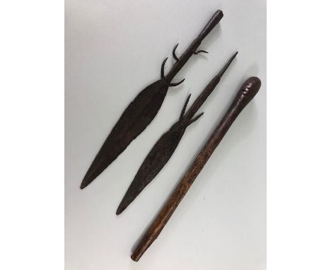 Tribal interest, Hand forged Iron spear heads and an Aboriginal wooden club 