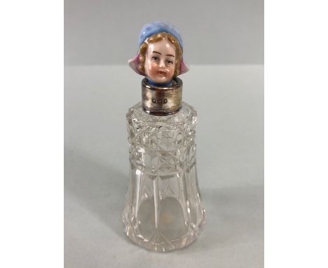 English hallmarked silver mounted sent bottle with china headed stopper of a dutch Girl, approximately 12cm high