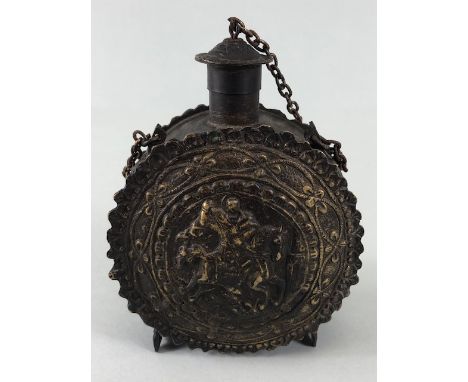 Military interest, Eastern European metal powder flask  decorated with embossed geometric designs and an image of St George a