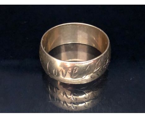 9ct Gold ring/ band engraved with floral sprigs and the words "I love you" size approx 'R' and 6.0g