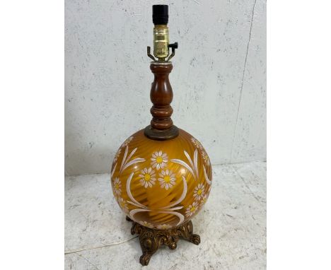 European twisted amber glass table lamp decorated with painted daisys