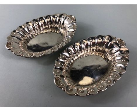 Pair of Edwardian Hallmarked Silver dishes with repoussé decoration hallmarked for Sheffield by maker James Dixon & Sons Ltd 