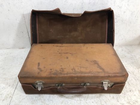 Antique luggage,  Gentleman's Pig Skin leather suit case lined in green Moroccan leather  with canvas protective cover approx