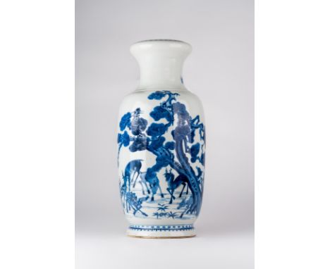 Chinese Art. A blue and white vase decorated with deers and bearing a Kangxi double circle underglaze blue mark at the base  