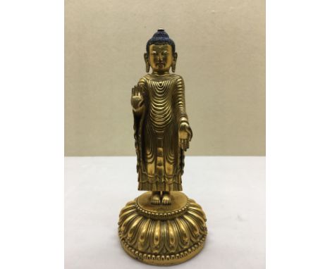Himalayan Art. A gilt bronze figure of standing Udayana Buddha. Yongle six character mark engraved at the base and possibly o