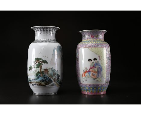 Chinese Art. Two polychrome porcelain vases decorated with ladies and a child and with a lake landscape and a long inscriptio