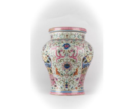 Chinese Art. A famille rose porcelain stool bearing a Qianlong six character seal mark within a cartouche on the upper edge  