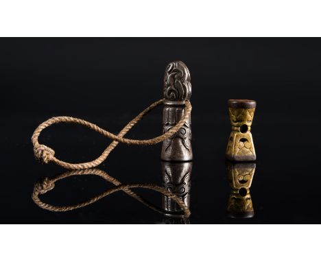 Himalayan Art. Two seals and a bronze hourglass Tibet, 18th-19th century  . Provenance: Adriano Moscatelli collection, Rome. 