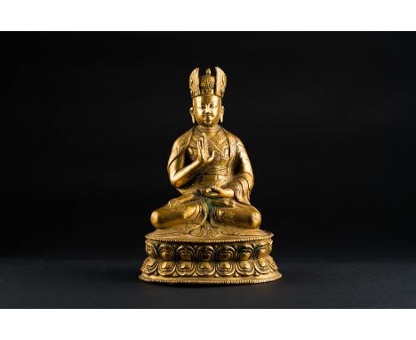 Himalayan Art. A gilt bronze figure portraying the Second Karmapa: Karma Pakshi (1204-1283)  Nepal, 20th century . Provenance