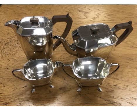 A George V silver four piece tea service, Stower &amp; Wragg Ltd, Sheffield 1932, comprising teapot, hot water jug, sugar and