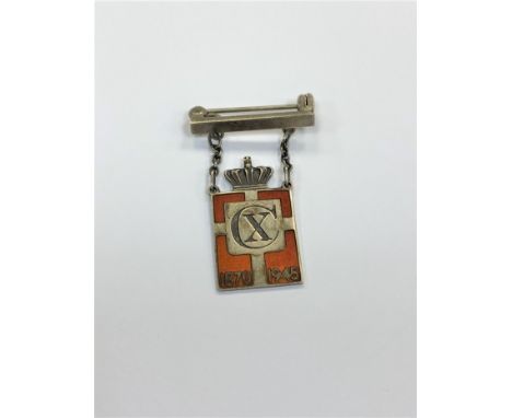 An unusual Georg Jensen silver and enamel pendant, Christian X of Denmark, 1870-1945 