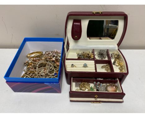 A leather jewellery box together with a further box containing costume jewellery, necklaces, bangles, earrings etc, miniature