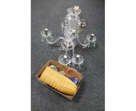 A contemporary glass six branch chandelier with glass drops together with a box of light shades and a contemporary pendant li