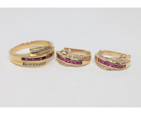 An 18ct gold diamond and ruby set ring, size R, with matching set of earrings 