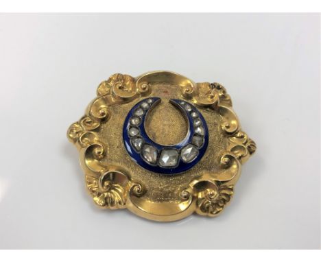 A superb quality large Victorian 15ct gold memorium brooch set rose-cut diamonds in blue enamel CONDITION REPORT: 48mm by 40m