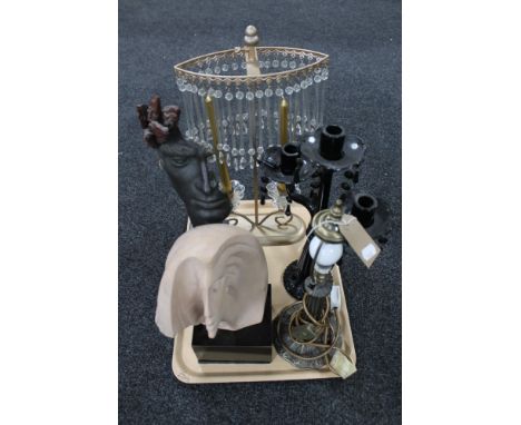 A tray of contemporary furnishings to include two sculptures on square bases, Gothic glass three way candlestick, candle hold