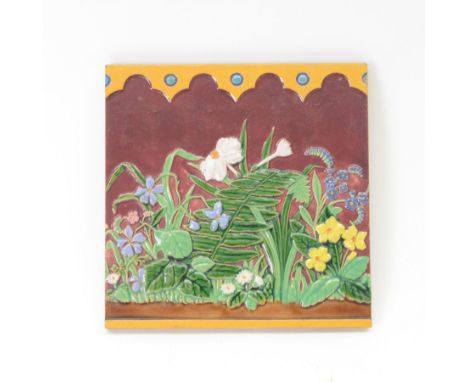 Late 19th Century Minton Hollins & Co press tile, relief moulded with a frieze of wildflowers between repeat yellow boarder, 
