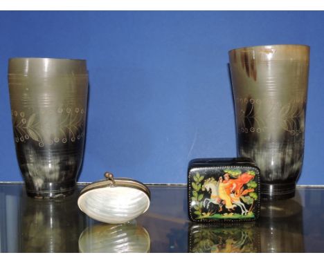 A pair of early 19th Century engraved horn beakers, together with a Russian papier mache snuff box and a Victorian shell pill