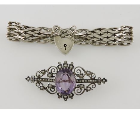 A sterling silver gatelink bracelet with heart shaped clasp, together with an amethyst and seat-pearl brooch set in white met