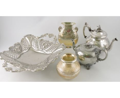 A silver plated teapot, engraved with foliage, together with four other items of platedware, (5)