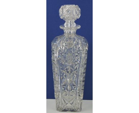 A square tapering cut glass decanter, with associated stopper, H. 27cm 