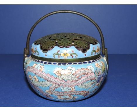 A Chinese light blue enamelled censor, the pierced lid above a dragon and phoenix, D. 8cm.