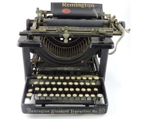 A Remington Standard No. 10 typewriter, finished in black with gold line detailing.