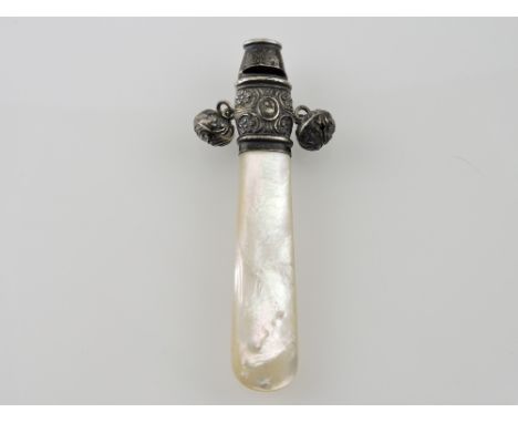 A child's mother of pearl teether, set with a silver whistle and bells, L.8cm.