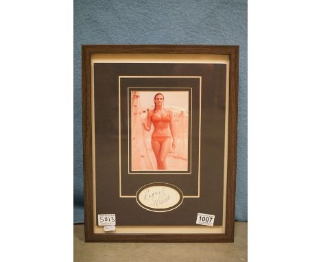 Memorabilia / Autograph - Raquel Welch autograph signed to card on 28th April 1967 making it a rare and early example.  Origi