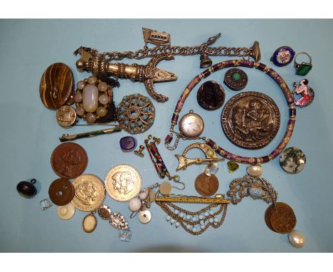 A purple glass cameo brooch with silver mount, Birmingham 1908, a small enamelled ceramic pendant, various hardstone brooches