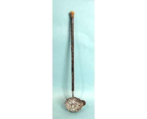 A late-George-III toddy ladle, the shaped bowl with embossed basket of flowers and foliate decoration, with wooden handle, Lo