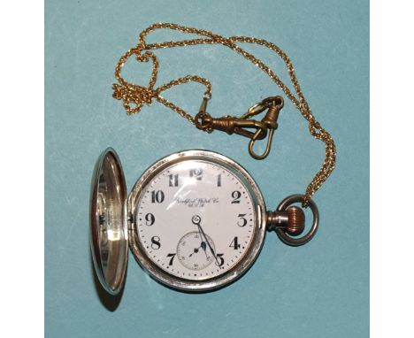 A silver hunter-cased keyless pocket watch, the white enamel dial signed Rockford Watch Co. USA, the case engraved Commandant